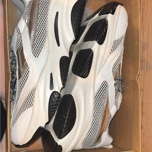 Woman’s White & Silver Athletic Mesh Sneaker